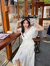 莫代爾溫柔風(fēng)v領(lǐng)泡泡袖連衣裙女2025夏季新款不規(guī)則系帶收腰荷葉邊長裙 杏色 M 95-105斤 曬單實拍圖