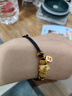 夕愛金樓黃金小金豬轉(zhuǎn)運(yùn)珠手鏈女款生肖飛天豬999足金本命年情侶紅繩手繩 飛天豬 黑繩款 金重約0.9-1.1g 曬單實(shí)拍圖