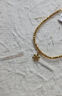 中國黃金（CHINA GOLD）黃金六瓣花蹦迪珠手鏈女款百搭素圈手飾品節(jié)日生日禮物送女友愛人 六瓣花蹦迪珠手鏈 約2g 曬單實拍圖