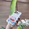 鑒百伊 卡通開心小叮當適用蘋果16promax手機殼iphone15pro新款14可愛個性13情侶高級感男女12磨砂11硅膠 開心哆啦A夢+支架 iPhone 12 Pro 曬單實拍圖