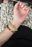 含春花金包銀卡家雙環(huán)手鐲女款四葉草雙圏手環(huán)黃金色鐲子光面素圈 圈口58 約25克 卡4.5/2.5mm 曬單實拍圖