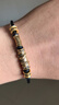 中國(guó)黃金（CHINA GOLD）黃金手鏈男女款足金饕餮彎管圖騰轉(zhuǎn)運(yùn)珠手繩情人節(jié)生日禮物送男友 【今/次日達(dá)】饕餮手繩【黑皮繩】約0.9g 曬單實(shí)拍圖