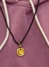 中國(guó)黃金（CHINA GOLD）黃金吊墜足金平安扣轉(zhuǎn)運(yùn)珠吊墜項(xiàng)鏈男女款編繩掛墜送女友生日禮物 轉(zhuǎn)運(yùn)平安扣約1.2g+金邊黑繩 曬單實(shí)拍圖
