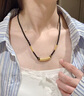老鳳祥黃金百福彎管項鏈男女足金路路通編織吊墜情人節(jié)生日禮物送男女友 百福彎管項鏈【黑繩】約0.3g 曬單實拍圖