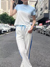 皮爾卡丹（pierre cardin）休閑運(yùn)動減齡套裝女2025夏季新款設(shè)計感短款上衣闊腿褲時尚兩件套 藍(lán)色拼白色套裝 XXL 曬單實拍圖