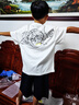 李寧童裝兒童夏季套裝男女小大童防潑水防曬寬松短袖短褲套裝YWBV039 標準白/黑色-1 140 曬單實(shí)拍圖