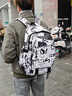 卡樂(lè )星男生電腦筆記本背包女初中生高中生書(shū)包超大容量大學(xué)生旅游雙肩包 小號黑白涂鴉+掛飾(適合3-6年級) 曬單實(shí)拍圖