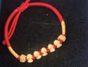中國黃金（CHINA GOLD）五福金蛇黃金手鏈女足金轉(zhuǎn)運紅繩手串七夕情人節(jié)禮物送女友生日 足金五福金蛇編繩手鏈-烤漆【京速達】 曬單實拍圖