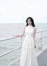 與欣掛脖裙子女夏季2025新款法式連衣裙夏天海邊度假氣質(zhì)收腰顯瘦長(zhǎng)裙 淺白杏色 均碼 【可備注碼數(shù)】 曬單實(shí)拍圖