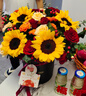 維爾斯全國(guó)向日葵康乃馨玫瑰抱抱桶花束配送喬遷之喜祝壽高考鮮花小時(shí)達(dá) 入金窩4朵向日葵+19朵紅玫香檳混搭抱抱桶 曬單實(shí)拍圖