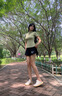 phigeer專(zhuān)業(yè)打羽毛球服女夏季防走光網(wǎng)球褲裙短袖健身服速干顯瘦運動(dòng)套裝 綠色短袖兩件套（黑裙） M 【推薦90-108斤】 曬單實(shí)拍圖