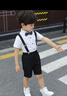 丸予六一兒童節(jié)合唱演出服古詩朗誦男童禮服小學生畢業(yè)表演服裝幼兒園 白襯衫+黑短褲+領(lǐng)結(jié)+背帶 130 建議體重40-48斤 曬單實拍圖