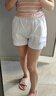 妙奕嘉白色短褲女夏季外穿2025新款高腰女士運動短褲休閑辣妹寬松顯腿長 白色高腰a字運動休閑短褲 L 曬單實拍圖