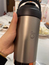 JCZS德國品牌陶瓷內(nèi)膽大容量保冷杯男士便攜帶提手水杯隨行咖啡杯 奶霜白500ml【316無縫內(nèi)膽】 曬單實拍圖