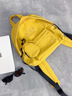 LEE輕盈簡(jiǎn)約學(xué)生書(shū)包男2025秋冬新款帽檐雙肩包潮流百搭休閑背包女 姜黃色（小號/可放9.7寸ipad） 曬單實(shí)拍圖