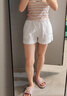 妙奕嘉白色短褲女夏季外穿2025新款高腰女士運動短褲休閑辣妹寬松顯腿長 白色高腰a字運動休閑短褲 L 曬單實拍圖