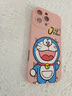 圣圖朗哆啦A夢適用蘋果16promax手機殼新款iphone14高級感15卡通男12可愛女8plus液態(tài)硅膠11植絨全包防摔 魅影-砂粉-開心多來A夢粉底  iPhone 16 pro max 曬單實拍圖