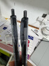 uni三菱 uni-ball UMN-105按動黑色中性筆高顏值0.5黑筆簽字筆商務學生考試水筆水性筆套裝 12支 曬單實拍圖