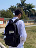 回力雙肩包男士2025新款百搭大容量大學(xué)生背包女生簡(jiǎn)約初中生高中書(shū)包 黑色【帶棋盤(pán)熊掛件】 曬單實(shí)拍圖