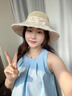 目丸蕾絲花朵草帽女夏季新款海邊沙灘度假遮陽(yáng)防曬帽法式鏤空草編帽子 花朵蝴蝶結草帽【米白色】 曬單實(shí)拍圖