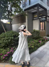 乖甜星海邊度假風無袖掛脖連衣裙女學生2025時尚氣質(zhì)長款溫柔風A字裙子a 掛脖連衣裙 M 【建議90-105斤穿】 曬單實拍圖