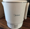 美的（Midea）迷你便攜式燒水杯折疊小容量電熱水壺旅行316不銹鋼自動斷電蒸飲煮學(xué)生泡面杯MK-SH07S104-PRO 曬單實(shí)拍圖