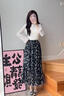 塔馳密司 TOUCH MISS度假風(fēng)印花半身裙 法式復(fù)古碎花長(zhǎng)裙A字裙春季新款 黑色 常規(guī) M 曬單實(shí)拍圖