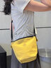 LEE輕便戶(hù)外斜挎包女2025新款小眾設計水桶包時(shí)尚百搭單肩包男高級感 姜黃色 曬單實(shí)拍圖