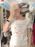 妙奕嘉白色斜肩短袖女t恤夏季新款2025潮流露肩上衣正肩顯瘦遮肚子甜美 白色手繪蝴蝶結字母涂鴉露肩t恤 L 【建議80-115斤】 曬單實(shí)拍圖