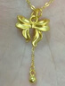 中國黃金（CHINA GOLD）黃金蝴蝶結(jié)項鏈女款足金圓珠流蘇吊墜情人節(jié)生日禮物送女友愛人 今/次日達*蝴蝶結(jié)吊墜+S925圓珠鏈 約0.3g 曬單實拍圖