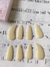 音夕真駱駝骨指甲純天然手工打磨彈古箏義甲成人兒童音樂(lè )學(xué)院演奏指甲 單面弧中號+禮包 曬單實(shí)拍圖