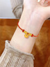 六桂福珠寶 LIU GUI FU JEWELRY盤纏黃金手鏈女1g足金福袋轉(zhuǎn)運珠編織紅手繩款手串畢業(yè)禮物送女友 足金盤纏福袋轉(zhuǎn)運珠手繩 0.91g 曬單實拍圖
