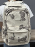 Walker Shop品牌書(shū)包女初中生小學(xué)生少女減負護脊雙肩包高中大容量背包六年級 米色+小熊 曬單實(shí)拍圖