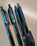 uni三菱 uni-ball UMN-105按動黑色中性筆高顏值0.5黑筆簽字筆商務(wù)學(xué)生考試水筆水性筆套裝 12支 曬單實拍圖