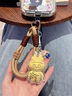 拉布布0.02克黃金999手機掛繩labubu潮牌掛件鑰匙扣送男女友禮物 2代拉布布咖色繩黃金0.02克 曬單實(shí)拍圖