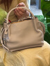 TOD'S【七夕禮物】官方2025早秋新品女士TIMELESS大T扣水桶包 奶油色 曬單實拍圖