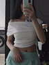 妙奕嘉斜肩上衣夏季短袖白色t恤女新款2025年女士短款純欲辣妹女裝修身 一字肩扭結(jié)露肩短袖 L 【建議115斤內(nèi)】 曬單實(shí)拍圖