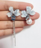 伊燦不對稱(chēng)鋯石花朵仿珍珠耳釘女高級耳環(huán)無(wú)洞耳夾2025年新款爆款耳飾 不對稱(chēng)鋯石花朵耳釘 曬單實(shí)拍圖