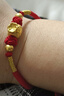 中國黃金（CHINA GOLD）黃金福袋手鏈女足金轉(zhuǎn)運(yùn)珠紅繩編織手繩手飾七夕送女朋友生日禮物 【京速達(dá)】福袋轉(zhuǎn)運(yùn)珠手鏈 約1.2g+品牌禮盒 曬單實(shí)拍圖