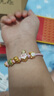 中國(guó)黃金（CHINA GOLD）足金招財(cái)貓手鏈女款桃花轉(zhuǎn)運(yùn)珠手繩粉皮繩七夕送女友生日禮物 招財(cái)貓手鏈【粉繩】 0.3g 曬單實(shí)拍圖
