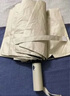 魔小宅24骨復(fù)古折疊雨傘男女晴雨兩用黑膠防曬遮陽全自動太陽傘雙人大號 24龍骨自動雨傘米白 曬單實拍圖