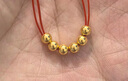 喜上眉梢黃金光面金珠999足金散珠3D硬金拋光面轉(zhuǎn)運(yùn)珠路路通情侶 4mm 重版光面轉(zhuǎn)運(yùn)珠四顆 0.8g 曬單實(shí)拍圖