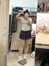 衣然呈品甜美高腰碎花半身裙女夏季2025款黑色韓系蛋糕裙防走光a字短裙女 黑色 M 【建議90-110斤】 曬單實(shí)拍圖