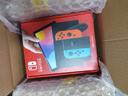 任天堂（Nintendo）【國內(nèi)保稅倉】Switch2/1代 OLED日版/港版游戲機(jī)續(xù)航加強(qiáng)版ns體感掌機(jī)便攜家用主機(jī) OLED日版紅藍(lán)64GB保稅（贈2年VIP會員） 曬單實(shí)拍圖