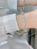 九樂(lè )經(jīng)典光面實(shí)心推拉銀手鐲子足銀999女年輕款送女友七夕情人節禮物 20克光面推拉手鐲 曬單實(shí)拍圖