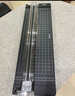 得力小型裁紙刀迷你切紙刀A4便攜裁紙機(jī)裁切照片手動(dòng)切紙機(jī)割紙刀美工刀裁剪器裁紙學(xué)生手工 黑 曬單實(shí)拍圖