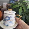 RSRDDY羊脂玉茶杯陶瓷水杯帶蓋過濾茶水分離泡茶馬克杯大容量輕奢禮盒裝 祥龍吐瑞四件套【金邊】 200mL(含)-400mL(含) 曬單實拍圖