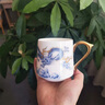 RSRDDY羊脂玉茶杯陶瓷水杯帶蓋過濾茶水分離泡茶馬克杯大容量輕奢禮盒裝 祥龍吐瑞四件套【金邊】 200mL(含)-400mL(含) 曬單實拍圖