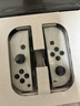 任天堂（Nintendo）【國內(nèi)保稅倉】Switch2/1代 OLED/續(xù)航加強(qiáng)日版/港版便攜家用ns體感游戲機(jī)掌機(jī) 日版OLED白色64GB保稅（贈共享會員） 曬單實(shí)拍圖