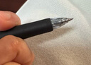 uni三菱 uni-ball UMN-138按動黑色中性筆高顏值0.38mm黑筆簽字筆商務(wù)學(xué)生水筆水性筆套裝 12支 曬單實拍圖